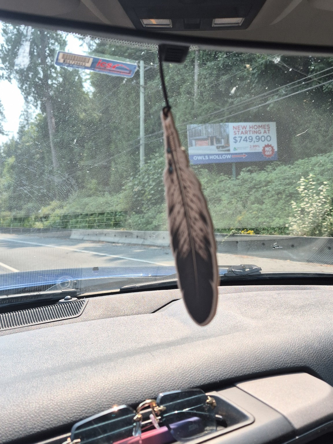 Scents of the Land air freshener in a vehicle
